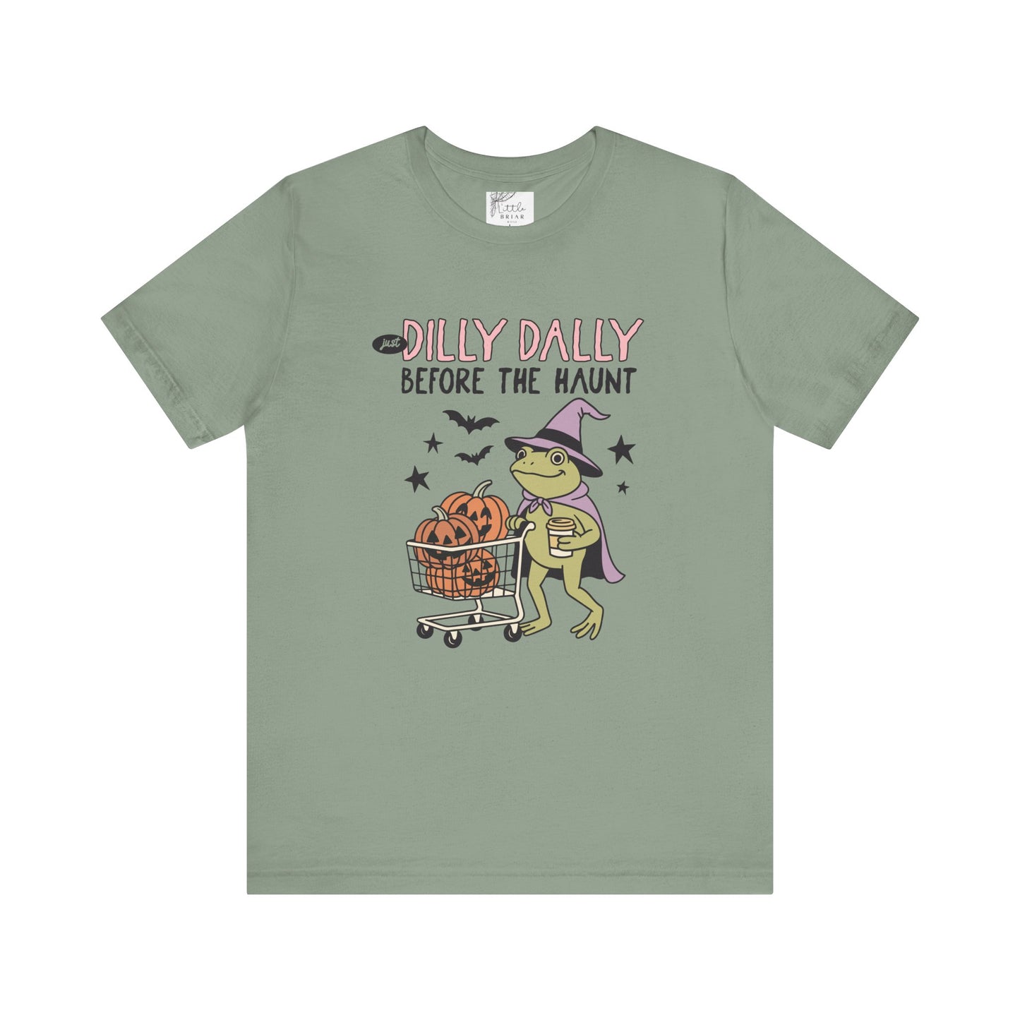 Green t-shirt with Halloween-themed graphic and text on a white background
dilly dally frog and pumpkin