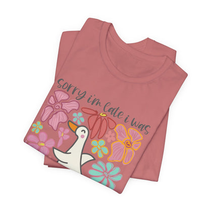 Floral Apology Tee - Unisex Jersey Short Sleeve T-Shirt with Playful Design