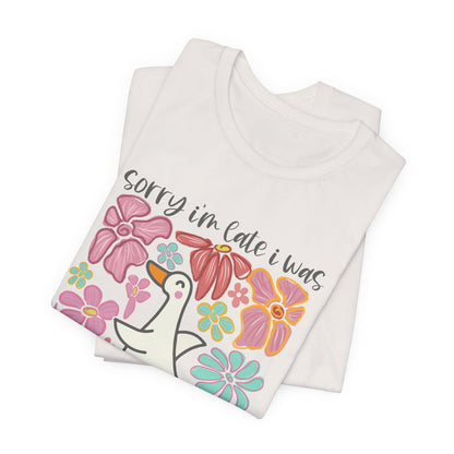 Floral Apology Tee - Unisex Jersey Short Sleeve T-Shirt with Playful Design