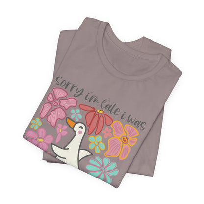 Floral Apology Tee - Unisex Jersey Short Sleeve T-Shirt with Playful Design